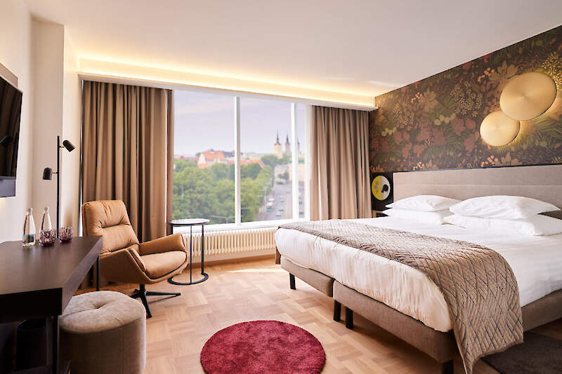 Nordic Hotel Forum   This modern business hotel is situated in the heart of Tallinn near Viru Gate, which leads into the old town. Visitors won't want to miss the old town's stunning cathedrals and churches, city wall, and Toompea Castle, all just a short stroll away. The hotel's rooms are chic and stylish with free Wi-Fi, while deluxe rooms are furnished with cosy canopy beds, and business class rooms also feature a Skype telephone. Business travellers will appreciate the contemporary meeting rooms and business centre, and all guests can enjoy international cuisine in the trendy in-house restaurant, and a quick lunch or a drink in the lobby bar after a busy day. The hotel also boasts a top-floor wellness centre with indoor pool, Jacuzzi, steam saunas, and gym with great views of the old town, as well as a children's play room, beauty salon, and valet underground parking, making for a pleasant, carefree stay in Tallinn.